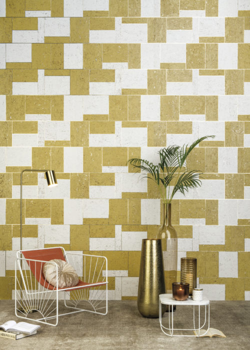 For the Khatam collection we were inspired by the intricacy of Venetian floor patterns and the exquisite designs of Persian marquetry which fuse Eastern and Western artwork. This picture shows the white, yellow and gold KHA22 wallcovering.