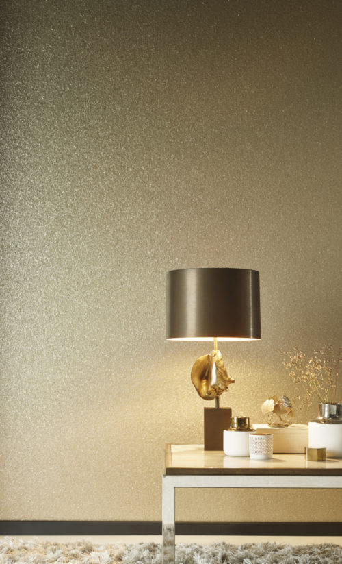 Delicate mica shells wallcoverings reflect the mood of your room. The mother-of-pearl is nicely combined here with lamp with brown shade and cream coloured accesories.