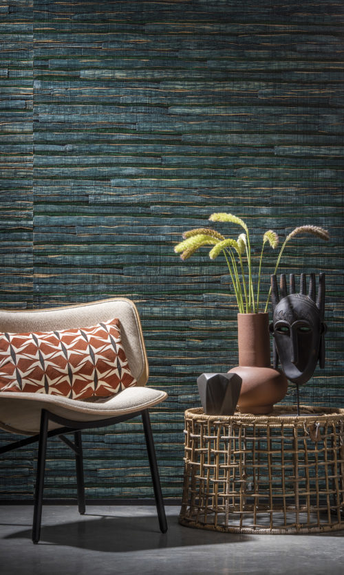 Omexco Seraya woven waterlily: the waterlily is a delightful aquatic plant that absorbs natural dyes beautifully. Malachite green and orpiment yellow fill interiors with intense colour.