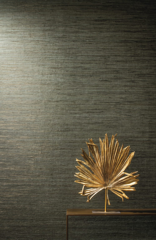 Raffia threads wallcovering from our Seraya collection in this close up: the raffia is delicately coloured in layered pastels or lacquered effects and laminated onto non woven paper. The collage is laid out on a metallic background, evocative of precious minerals.