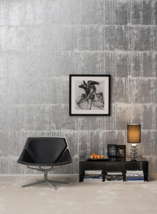 Antarès silver and white blocks wallcovering, black chair, painting with smoke.