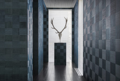 The Sycamore collection by Omexco is uniquely defined by a celebration of natural wood.  Our elegant and refined wallcoverings bring to life this noble and authentic material. We see a well lit hallway presenting the blue 'chess' design: squares of wood in different direction like a chess board.