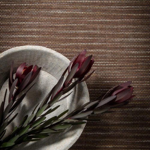 Woven multicoloured paper yarns for tactile temptation. Mood design from Omexco's Tribu collection.