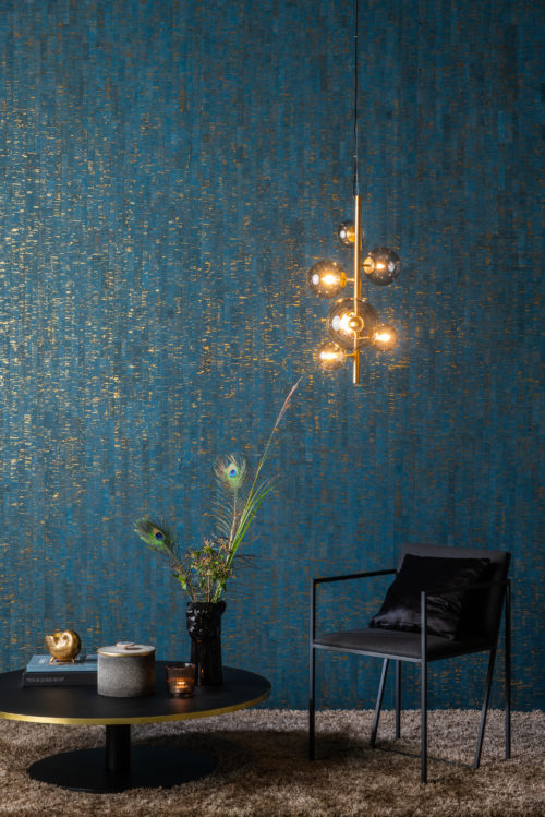 The Omexco Khatam collection: a timeless collection of contemporary neutral tones and shades contrasted with striking jewel colours. In this picture: peacock blue. Intimately connected with nature, the Khatam collection is authentic, elegant and entirely suited to modern living.