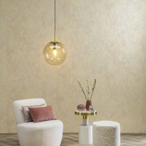 "Morning Dew" design from Omexco's Moonstone collection. Glassbeads are underprinted in powdery boudoir shades. Serene setting with a cosy chair, end table, modern glass pendant light and herringbone wooden floor.