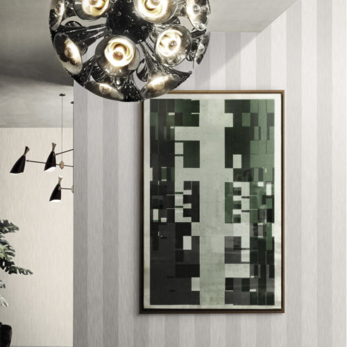 Outstanding chrome pendant lamp by Delightfull. Abstract painting. Striped Infinity wallcoverings in light and dark grey.
