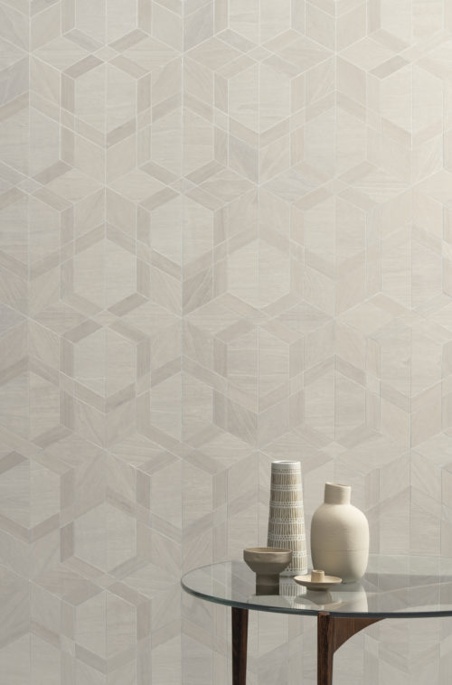 This picture shows a detail of the white and beige Cubist design from the Sycamore collection by Omexco. Sycamore is an exclusive collection of wood veneer wallcoverings to dress your walls in tactile beauty.